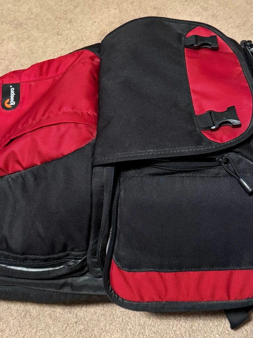 Nikon Camera Kit with Black Lenses and Red Strap
